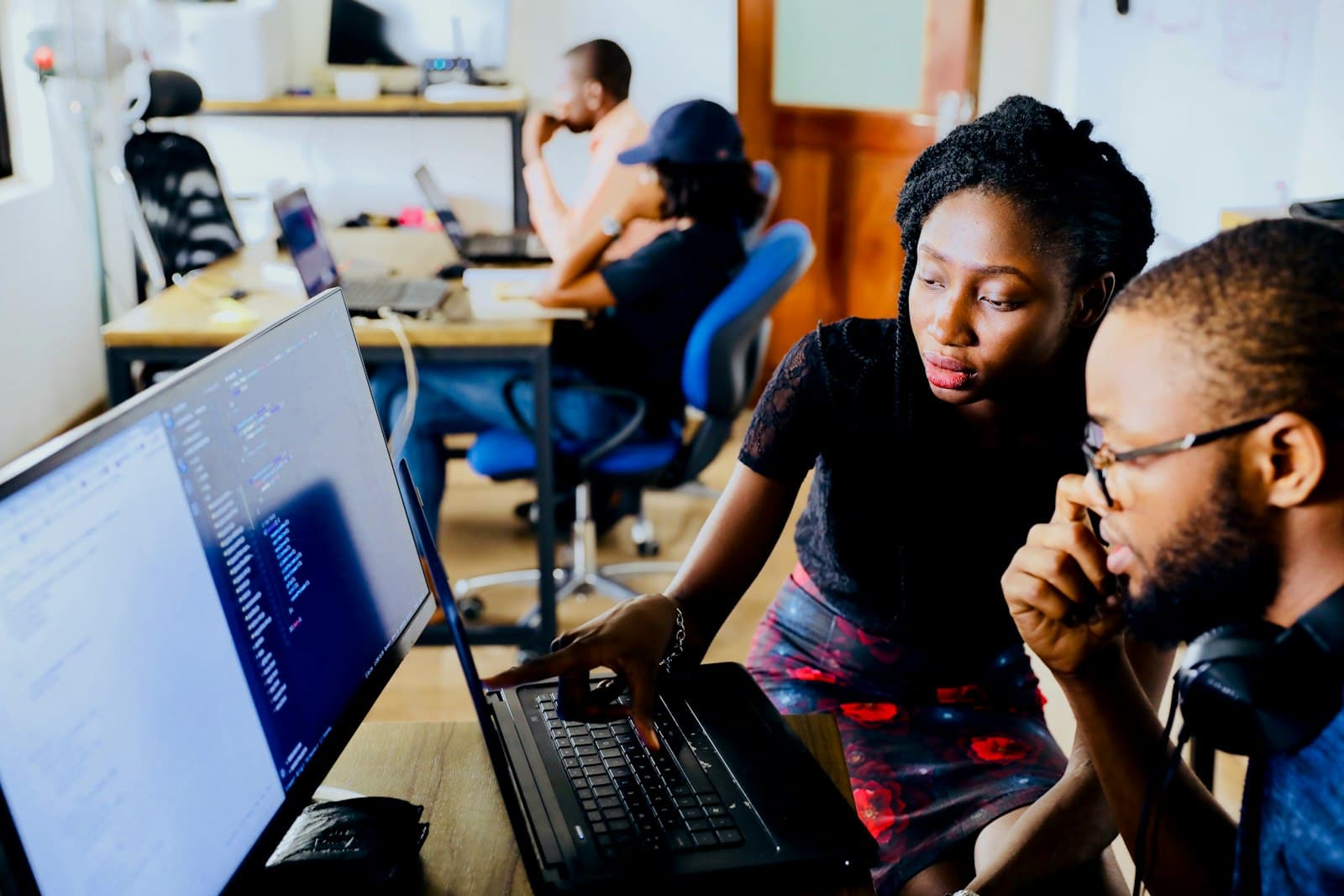 Engineers reviewing a Dynamics 365 implementation together